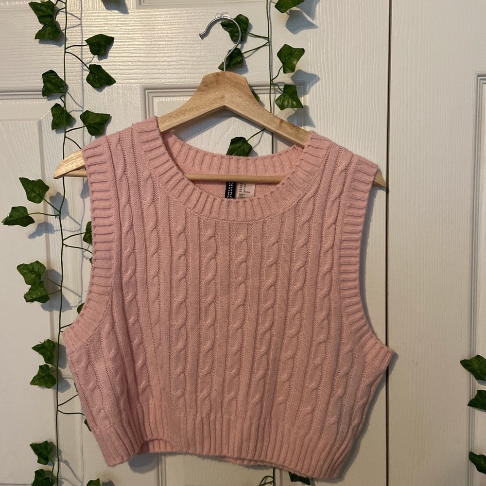 H&M pink sweater vest, fairly worn but no holes or rips in stitching